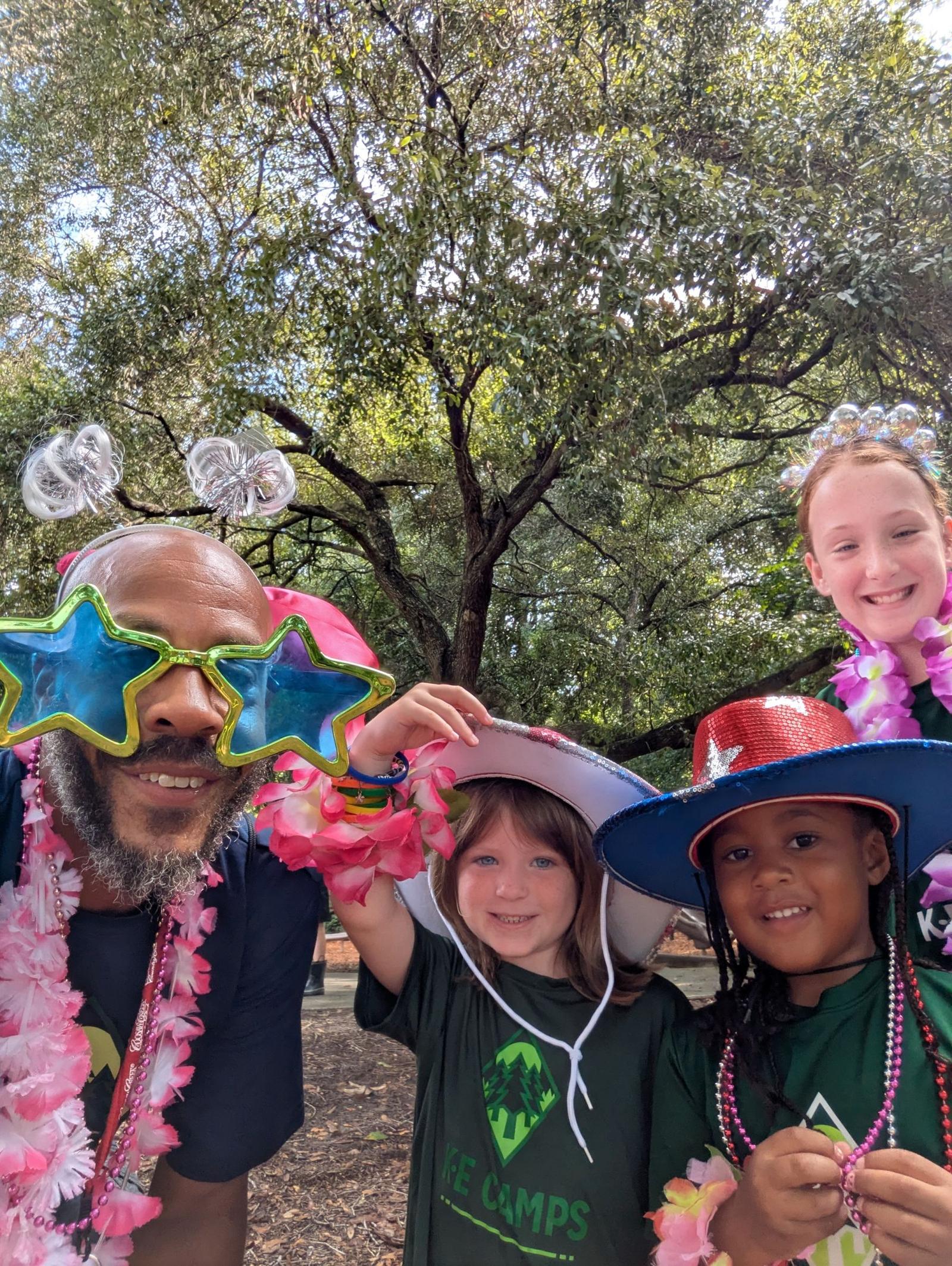 Camp director and campers in Wacky Wednesday costumes